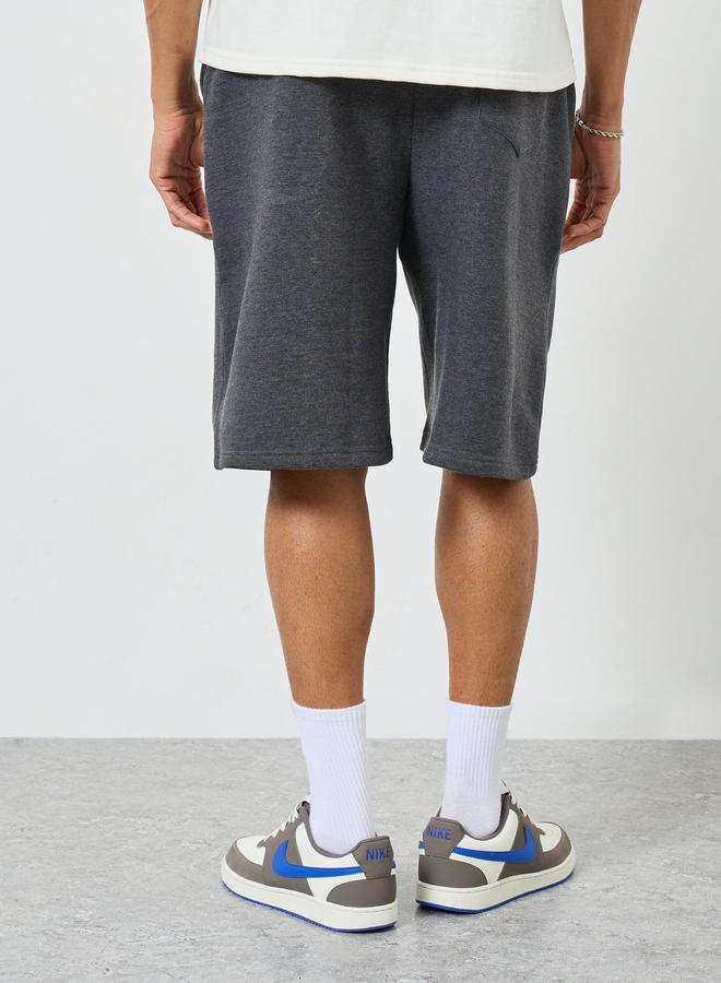 ستايلي طقم منسق من قميص وشورت بقصة واسعة للرجال - Image 3